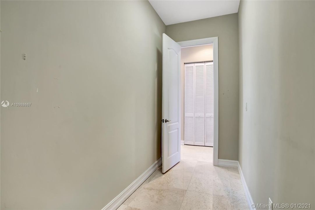 This space on the 3rd level used to function as one of the master suite's massive walk-in closet. Now can be used for storage, home office, or EASILY converted back to a substantial walk-in closet.