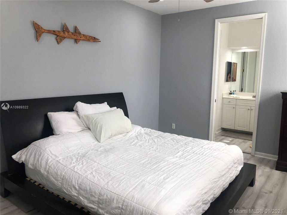 RETREAT TO THIS SPACIOUS MASTER BEDROOM