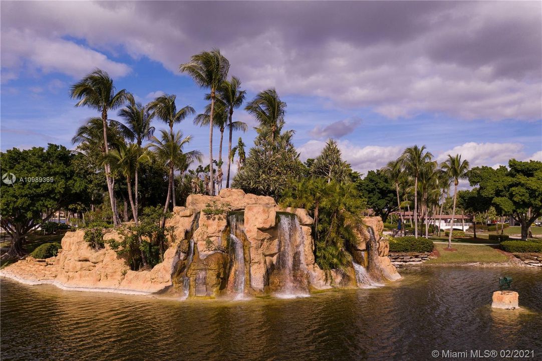 A beautiful cascade with lush landcaping and palms that over looks the biggest lake of the community is part of the Island Club icons and will enhance the resort style living that awaits you as an owner resident in this unique communty!