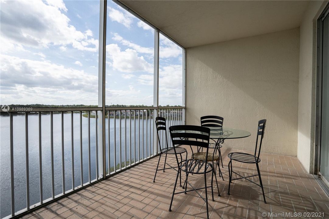 Approximately 13' 7" x 8' 6" Screened Terrace overlooking the lake brings privacy to this outdoor area.