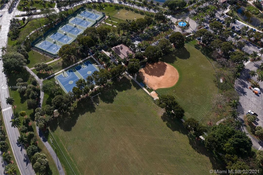 Outdoor Sport's area that includes, Soccer field, Basketball courts, Softball field and Tennis courts all walking distance from all subdivisions and accesible through an iluminated pathway.