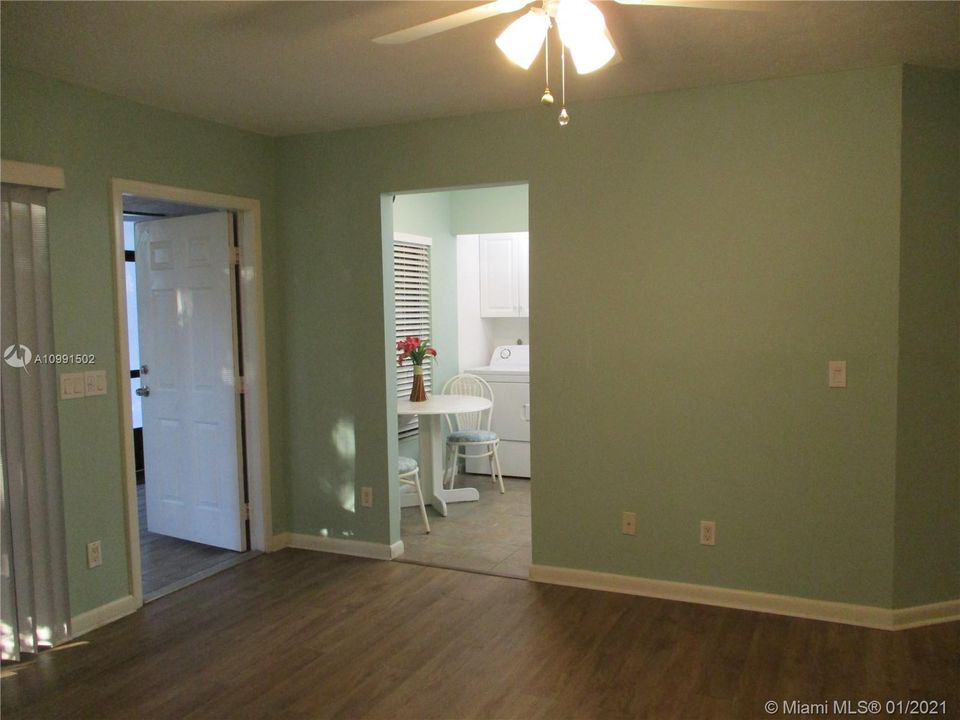 Living room with kitchen to left