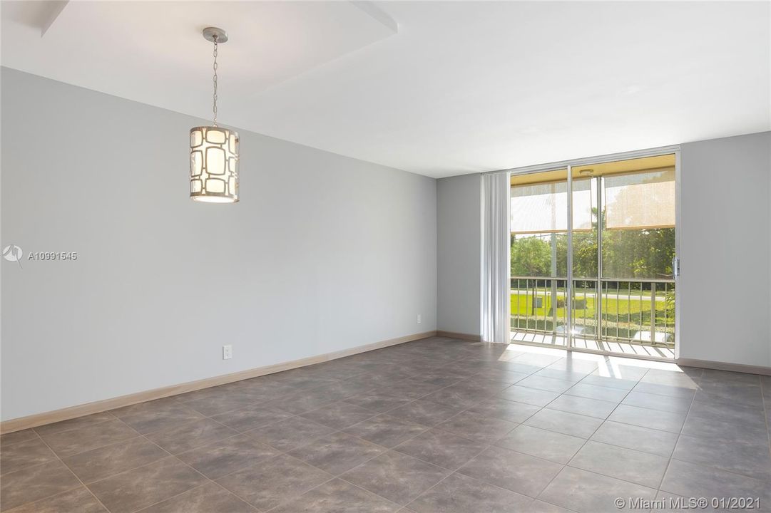 Open plan living and dining areas, feature lighting in dining area, verticals, natural light