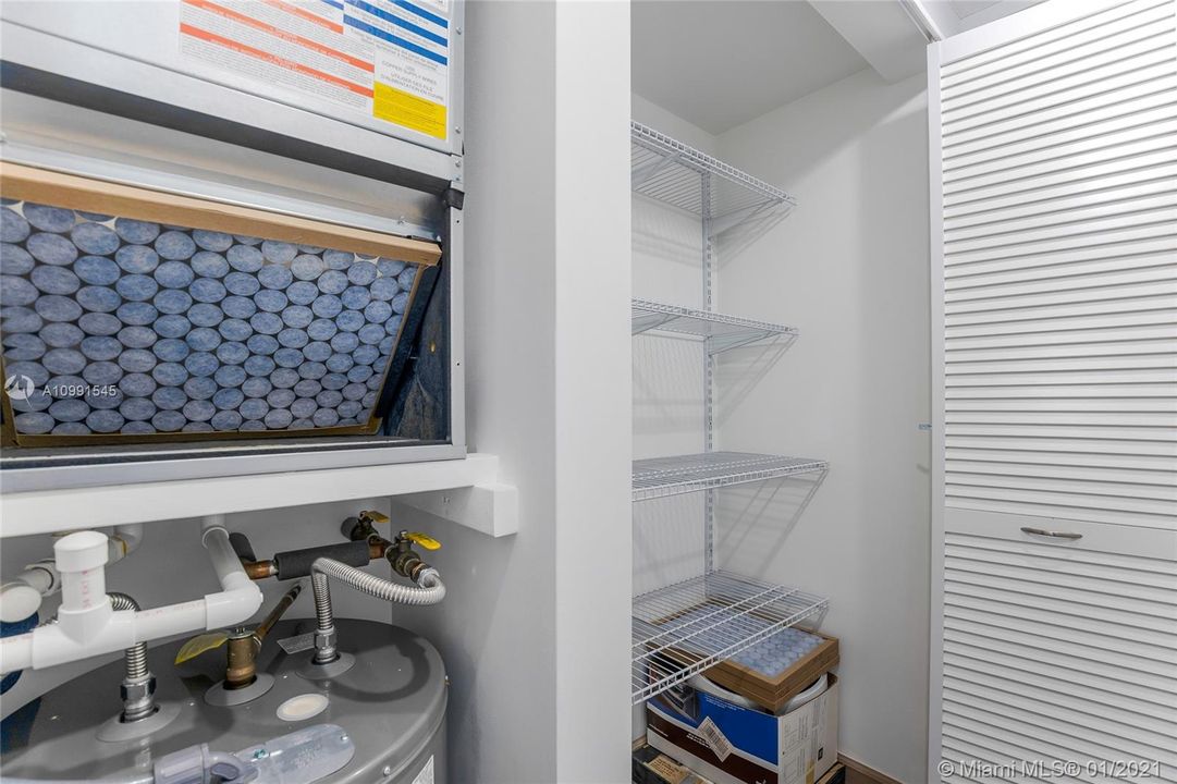 Additional storage area in laundry area.