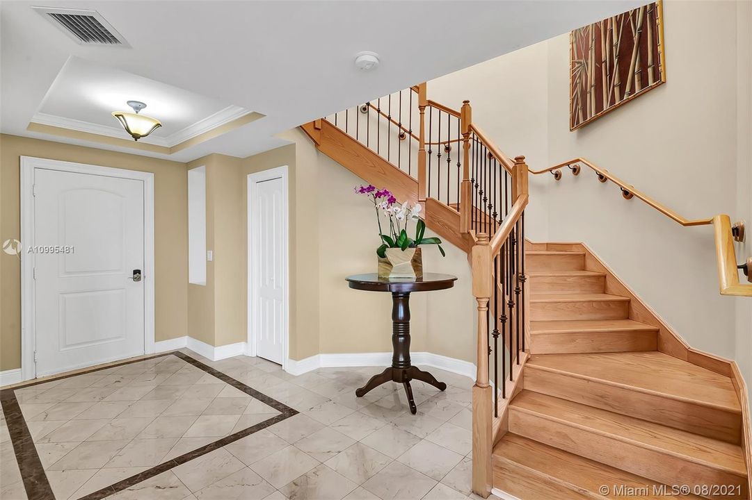 Winding staircase to the 2nd floor of your penthouse.