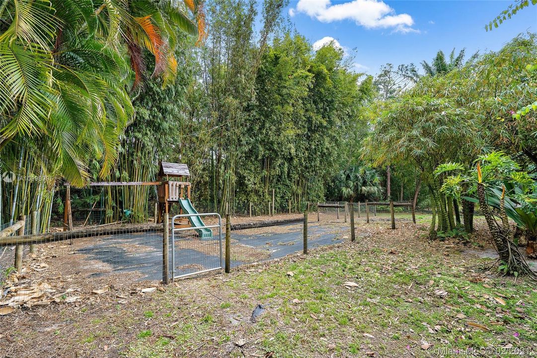 Fenced in kids play area.