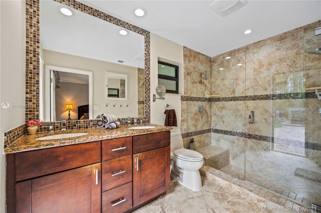 Master Bathroom - Dual Sinks - Shower and Cabana Door to Pool