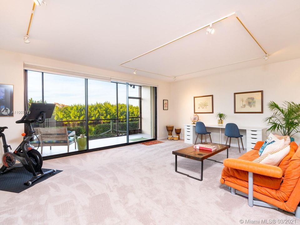 1st floor family room/office with a patio and amazing water views.