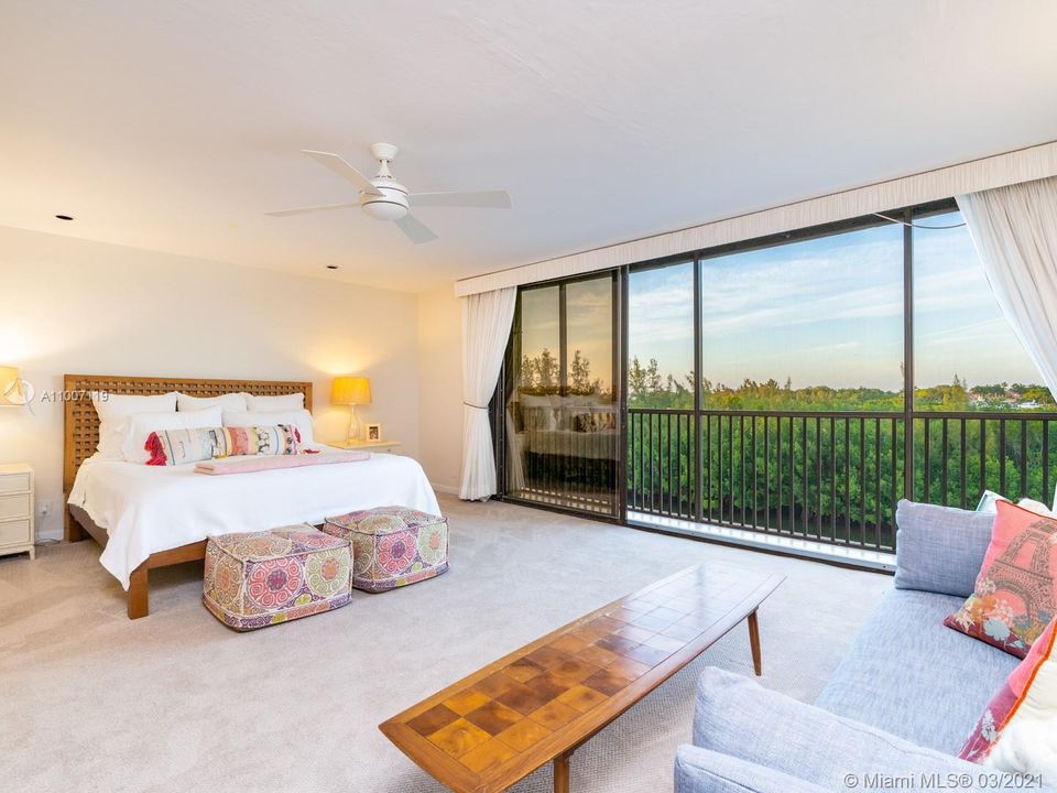 3rd floor spacious master bedroom. The views down the canal from bed are lovely!