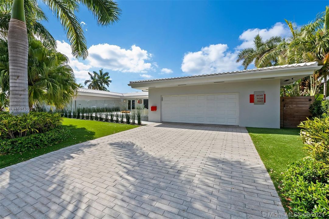 Pull up to your beautiful new paver driveway. Enjoy owning this totally modern, completely remodeled and  elegant inside and out.