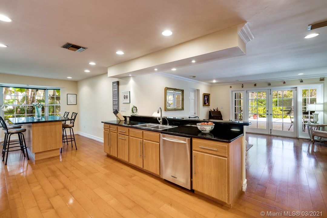 Gourmet Kitchen Opens Onto Poolside Family Room