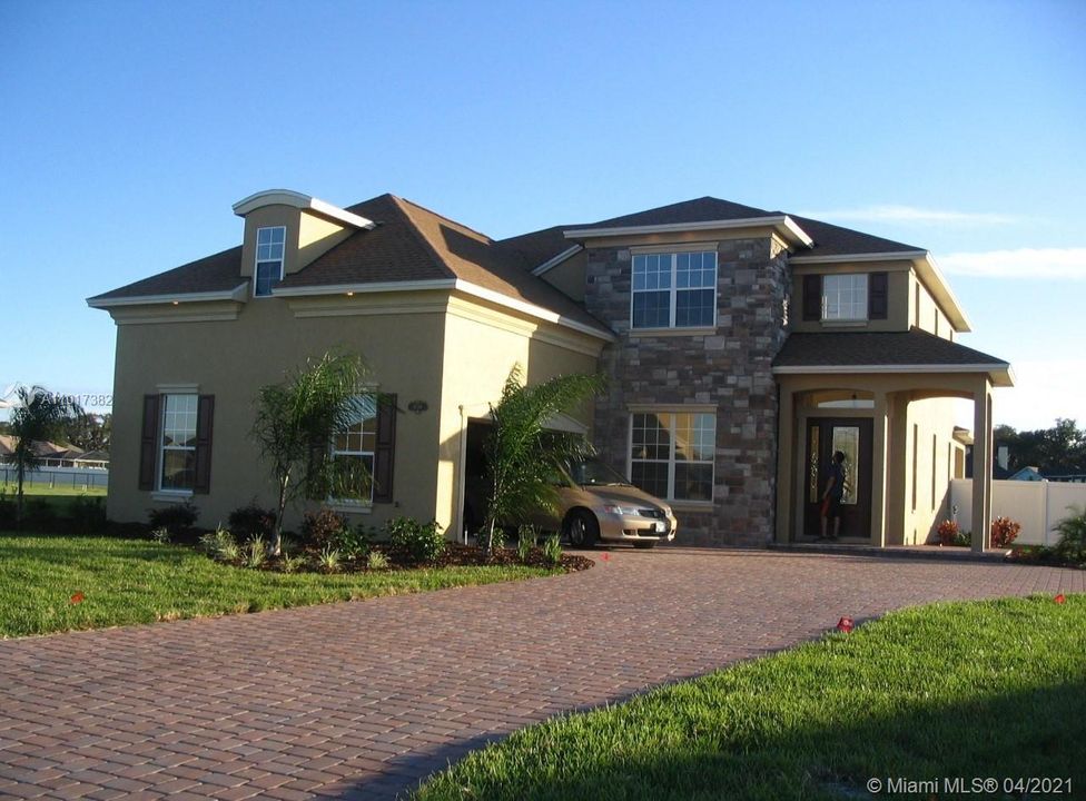 Beautiful  2 car garage home on an oversize lot and a charming porch