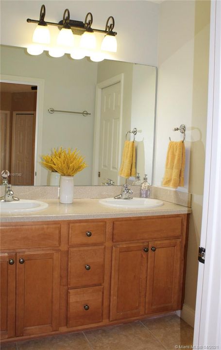 2nd Bathroom with dual sinks and separate tub area