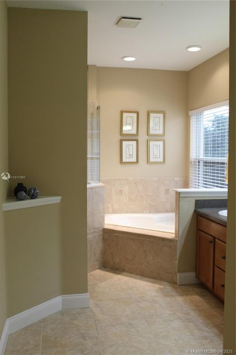 Master bath with separate shower and tub