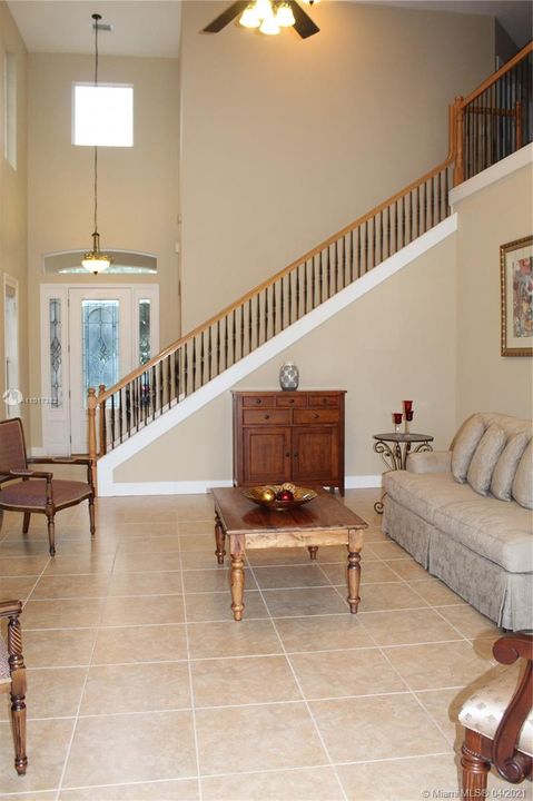 Majestic living room with gorgeous high ceilings. and a lot of bright light.