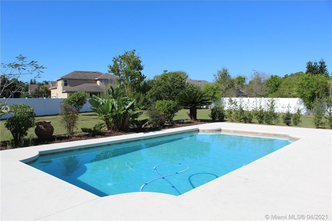 Large Pool deck, great for entertaining.