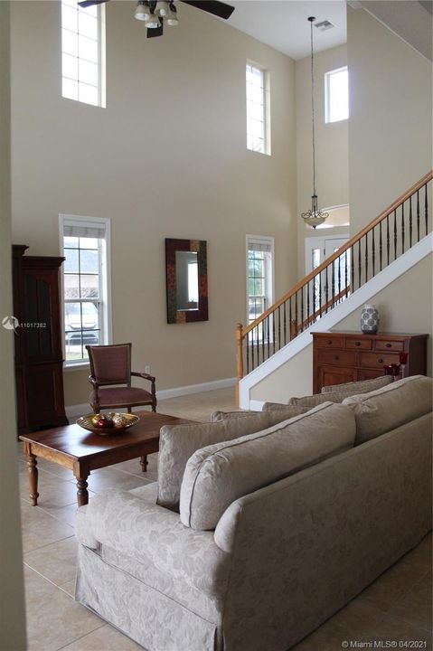 Living room with high ceilings, bright & light!