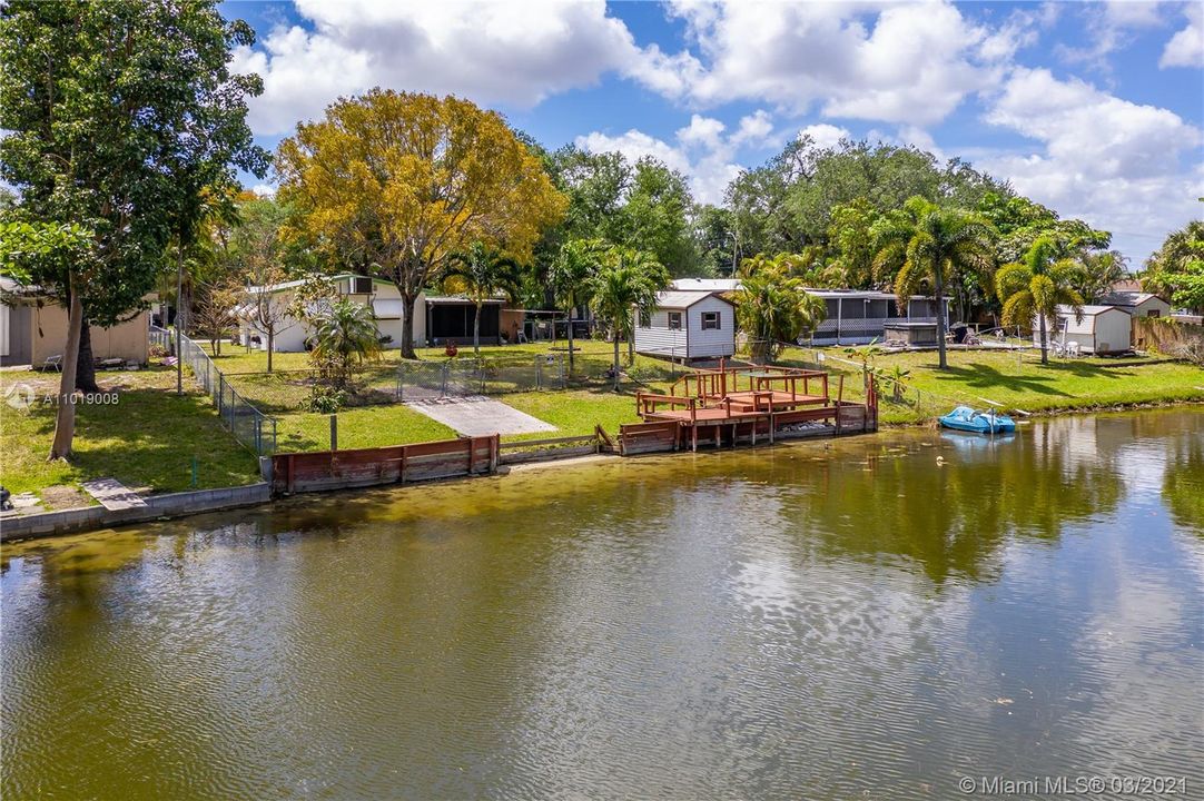 Spacious backyard overlooking canal