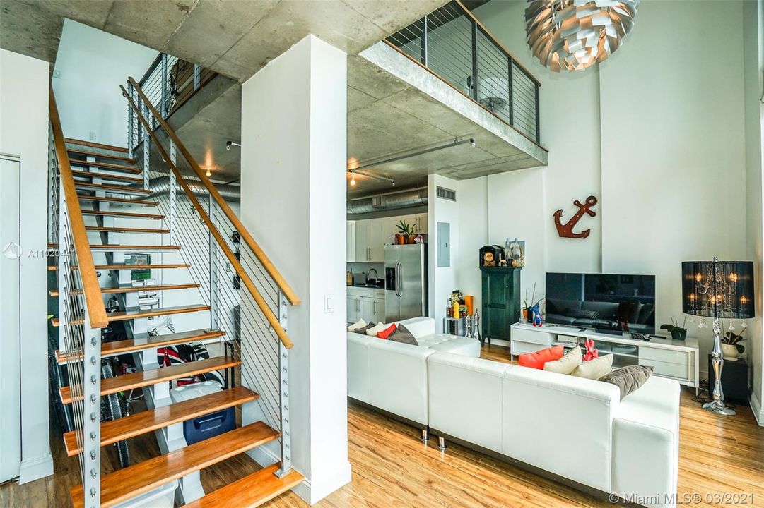 This is a 2-story loft with the bedrooms open to the 1st floor.