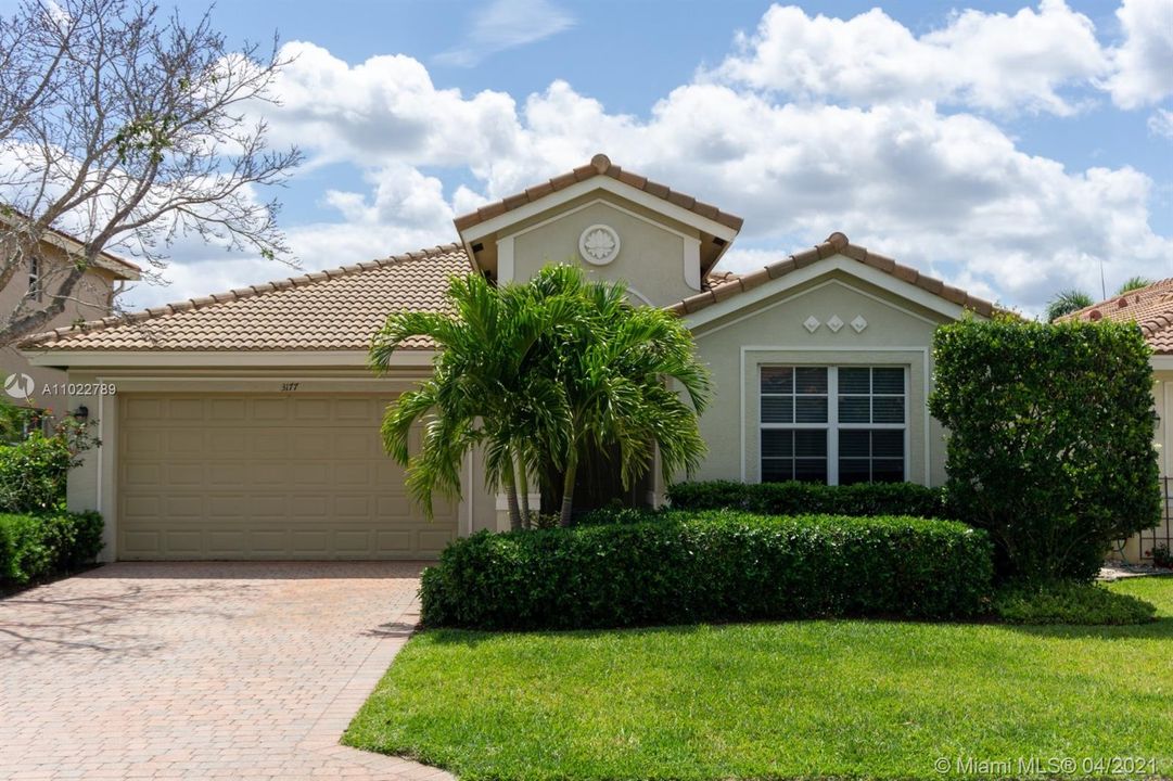 CBS home w/tile roof & impact windows