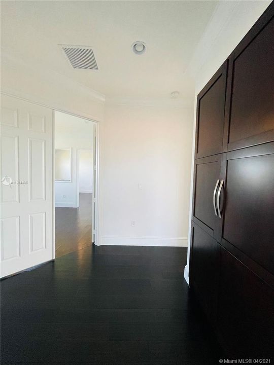 Entering second floor. Master bedroom has double-door entry. The entire second floor has wood floors.