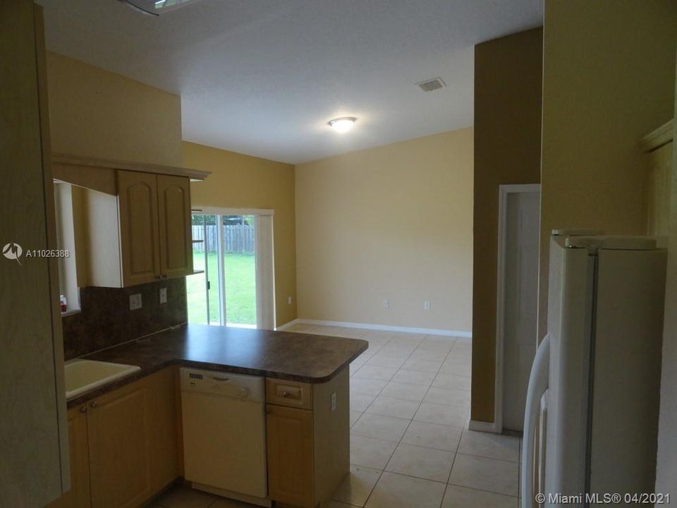 KITCHEN SNACK BAR AND FAMILY ROOM