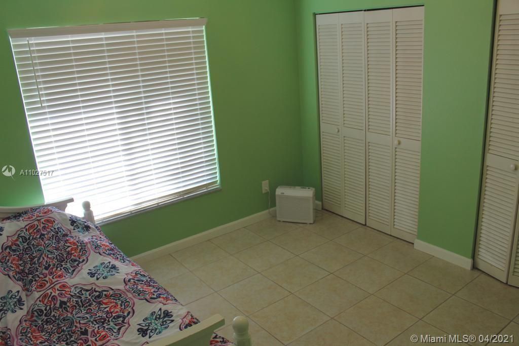 Guest bedroom with double closets