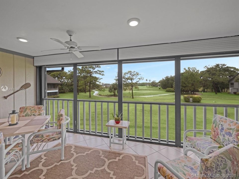 SCREENED LANAI WITH VIEW OF GOLF COURSE