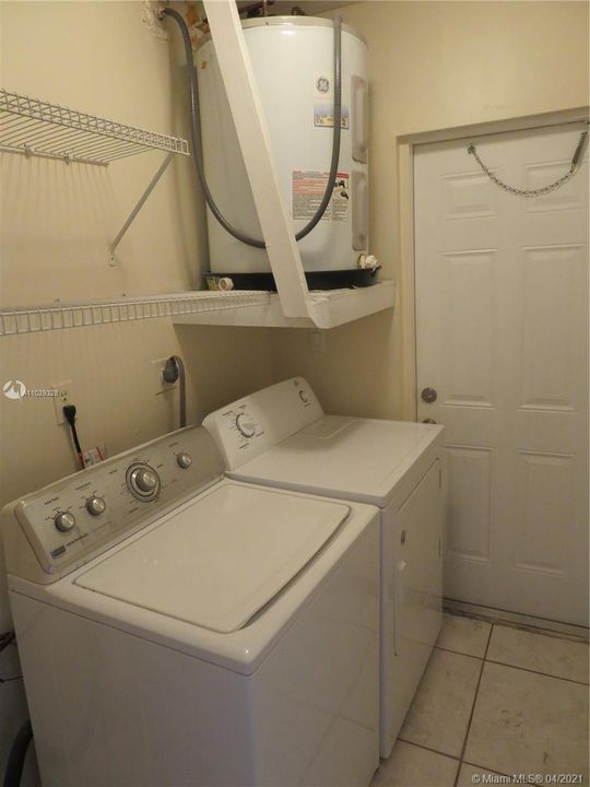 Laundry Room has Full-Size Washer and Dryer.