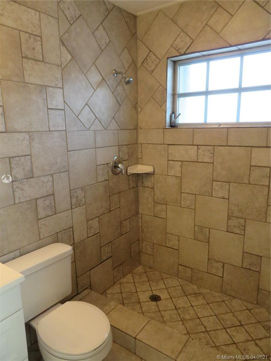 This Bathroom is accessible inside the Front Bedroom.