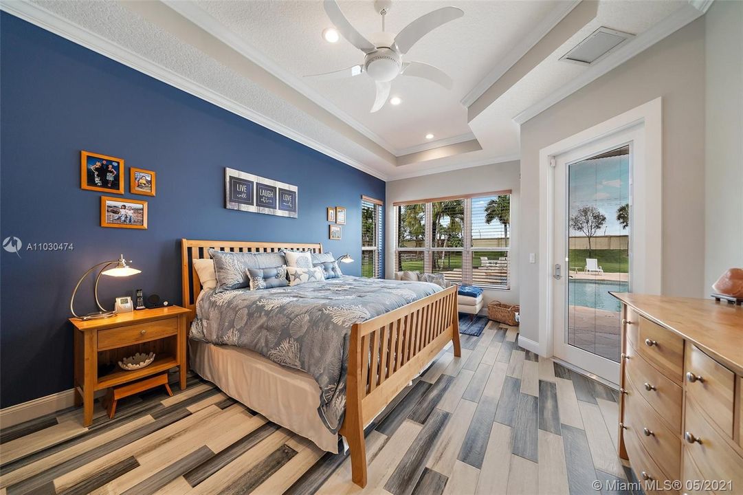 Spacious master bedroom with new impact windows and door.