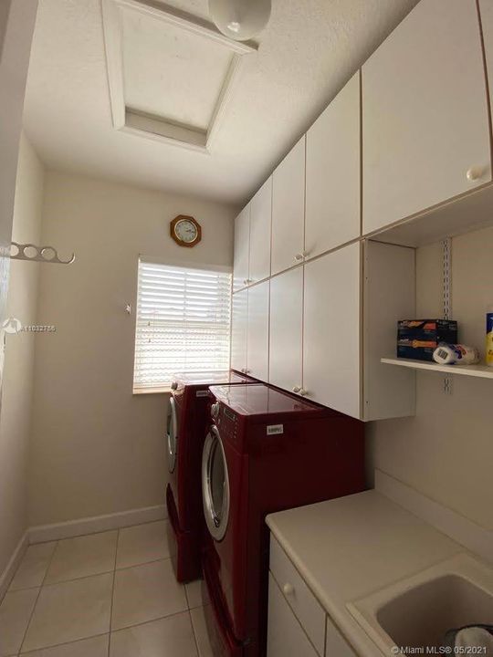 Laundry Room - Sink and Cabinets