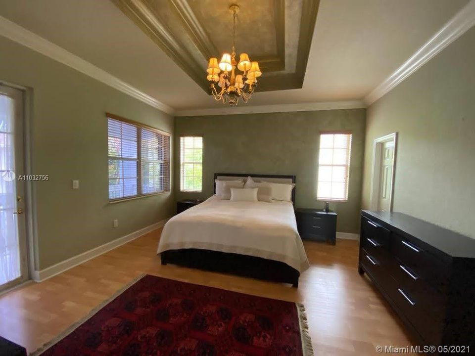 Master Bedroom with Balcony, Walk in Closets and Master Bathroom
