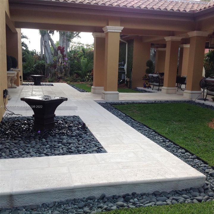 Walkway around Cabana with 2 gas in-line fire fountains