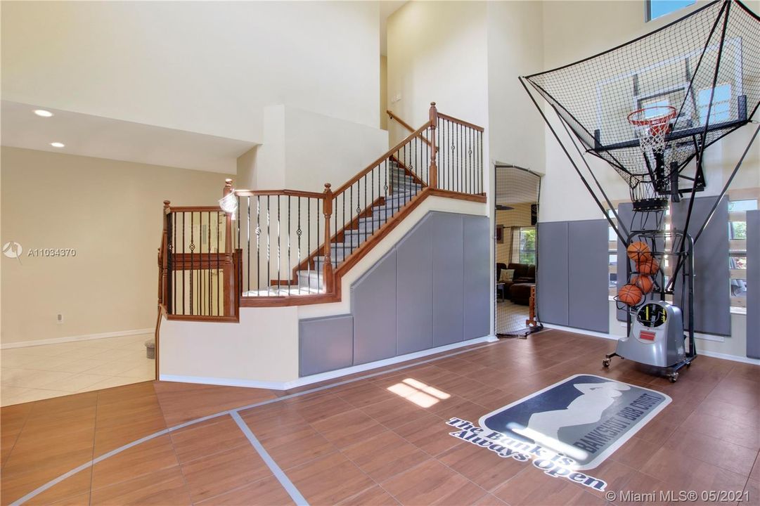 Living Room has been converted into a half court basketball court but seller can easily convert back into living area!!