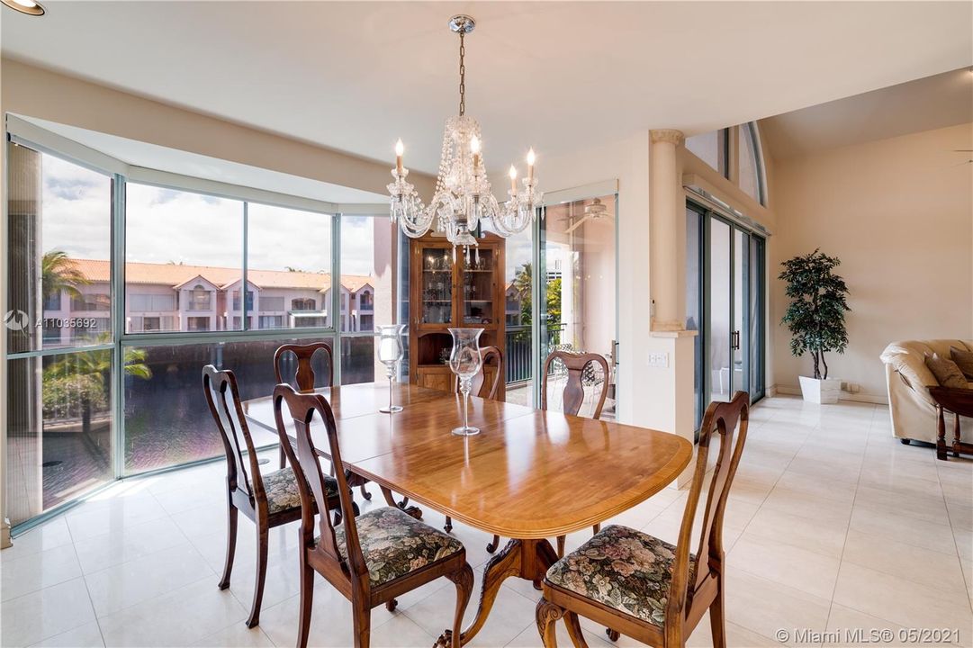 Dining room with double height windows for viewing pleasure