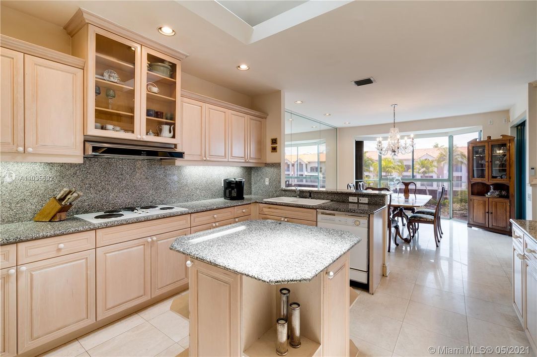 Kitchen has plenty of cabinet space and pantry