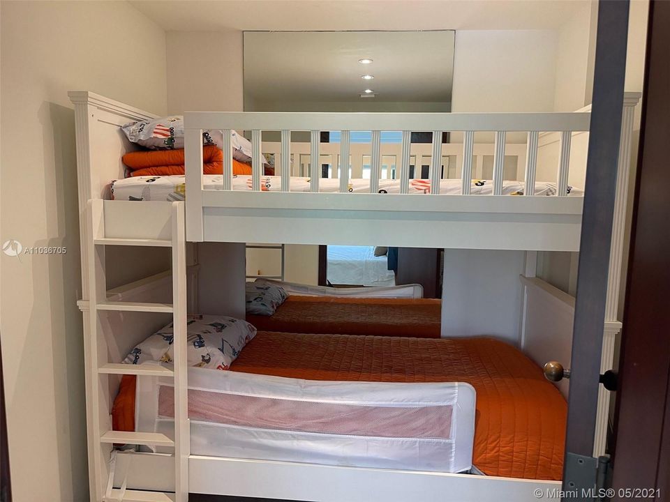 Master Walk in Closet that is currently used as a Den for younger children