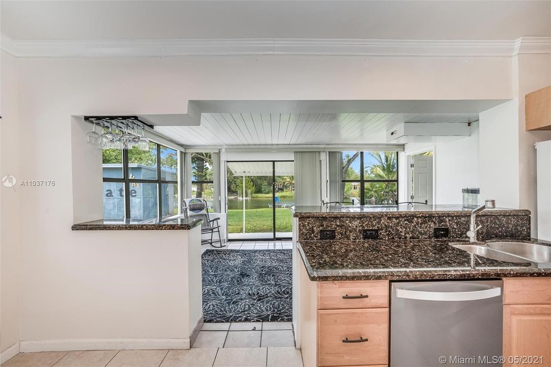 Open Kitchen/family room opens to spacious backyard and Lake