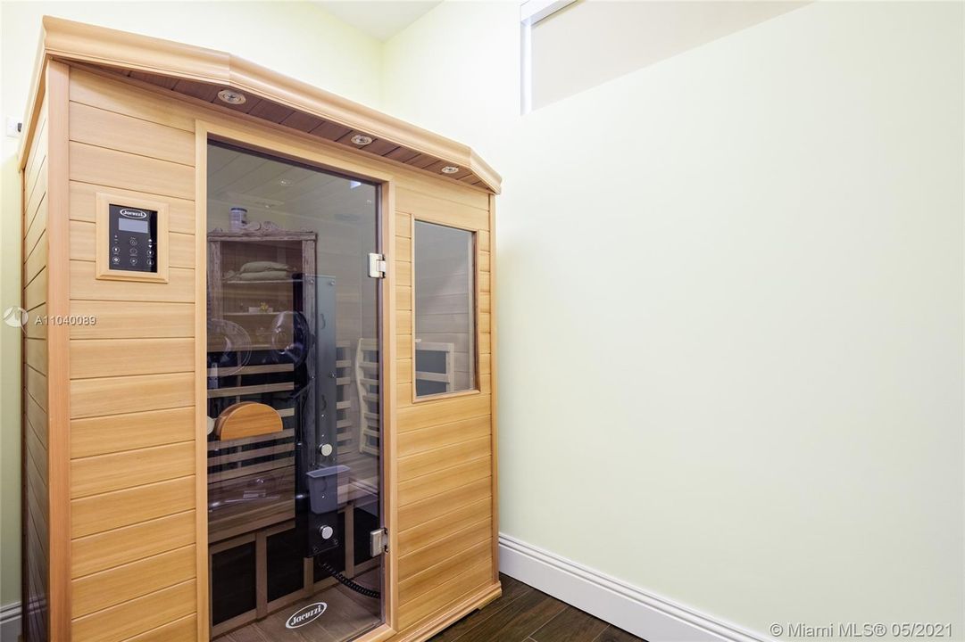 Sauna room with additional storage space.