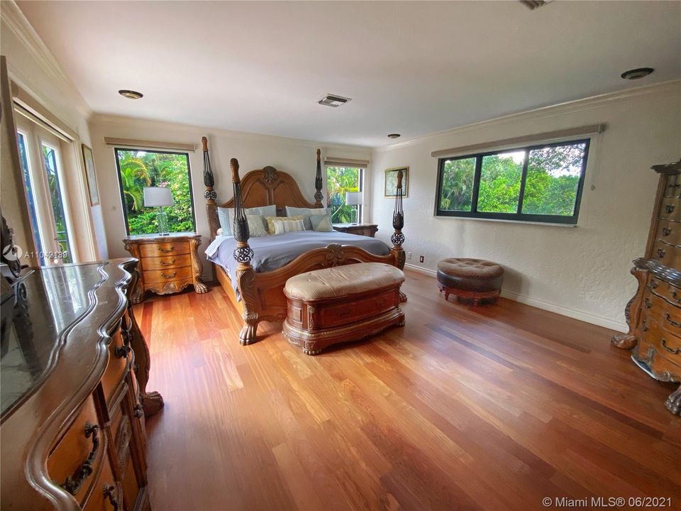 Master Bedroom, Cherry Wood Floors, Double Doors (Double Pane door) exits to balcony