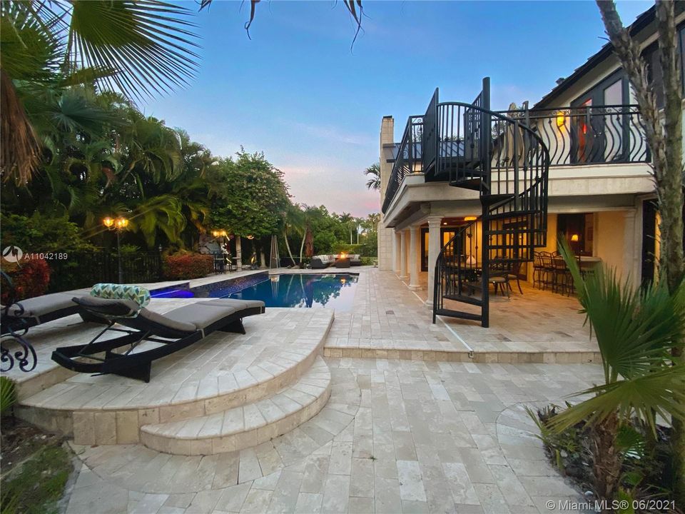 Pool, circular aluminum stairs leading to Balcony