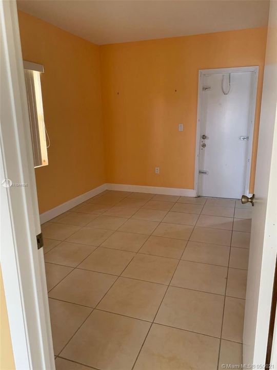 Master bedroom, master bath to the left and patio exit door.