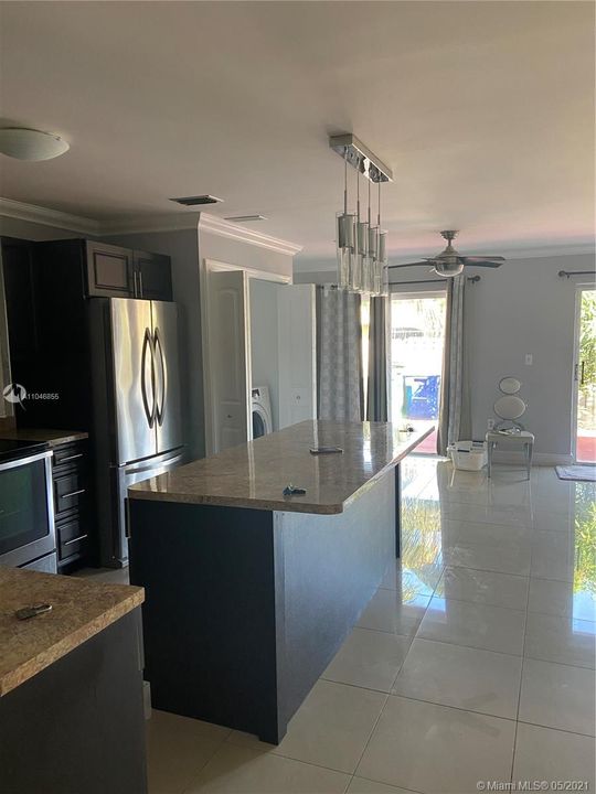 Lots of natural lighting from two sets of sliding doors in living/dining area.