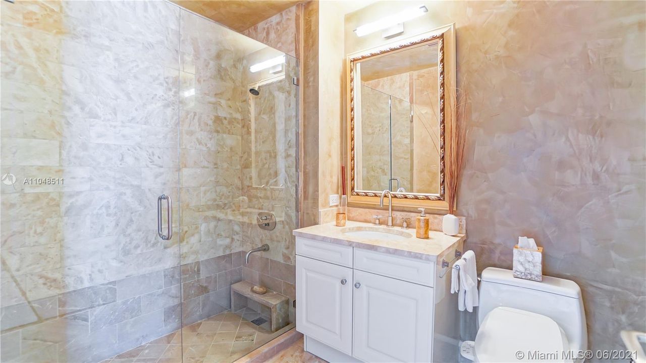 Stylish guest bathroom with large shower