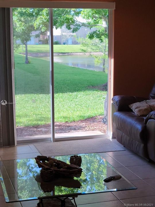 Family room w/View of yard and lake