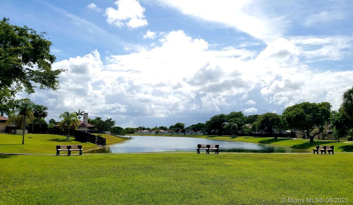 TWO ACRE FISH STOCKED LAKE GREEN AREAS FOR RELAXING OR EXCERCISING ENJOYING FLORIDA LIFESTYLE
