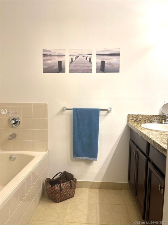 Shower/tub combination with double sink granite counter