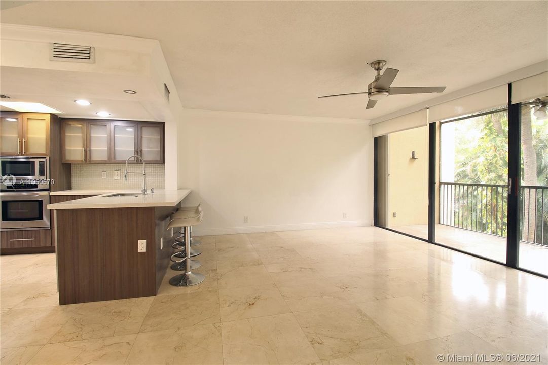 Open concept design, kitchen and living room.