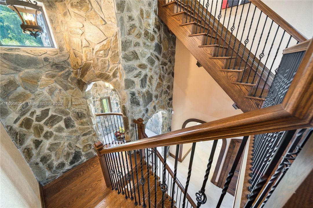 Photo facing down on solid wood staircase